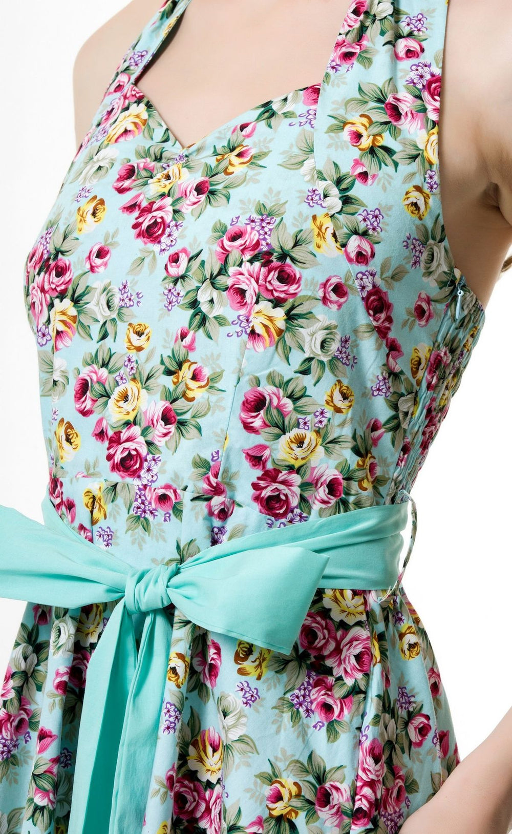 Close-up of aqua sash belt and rose floral print detail