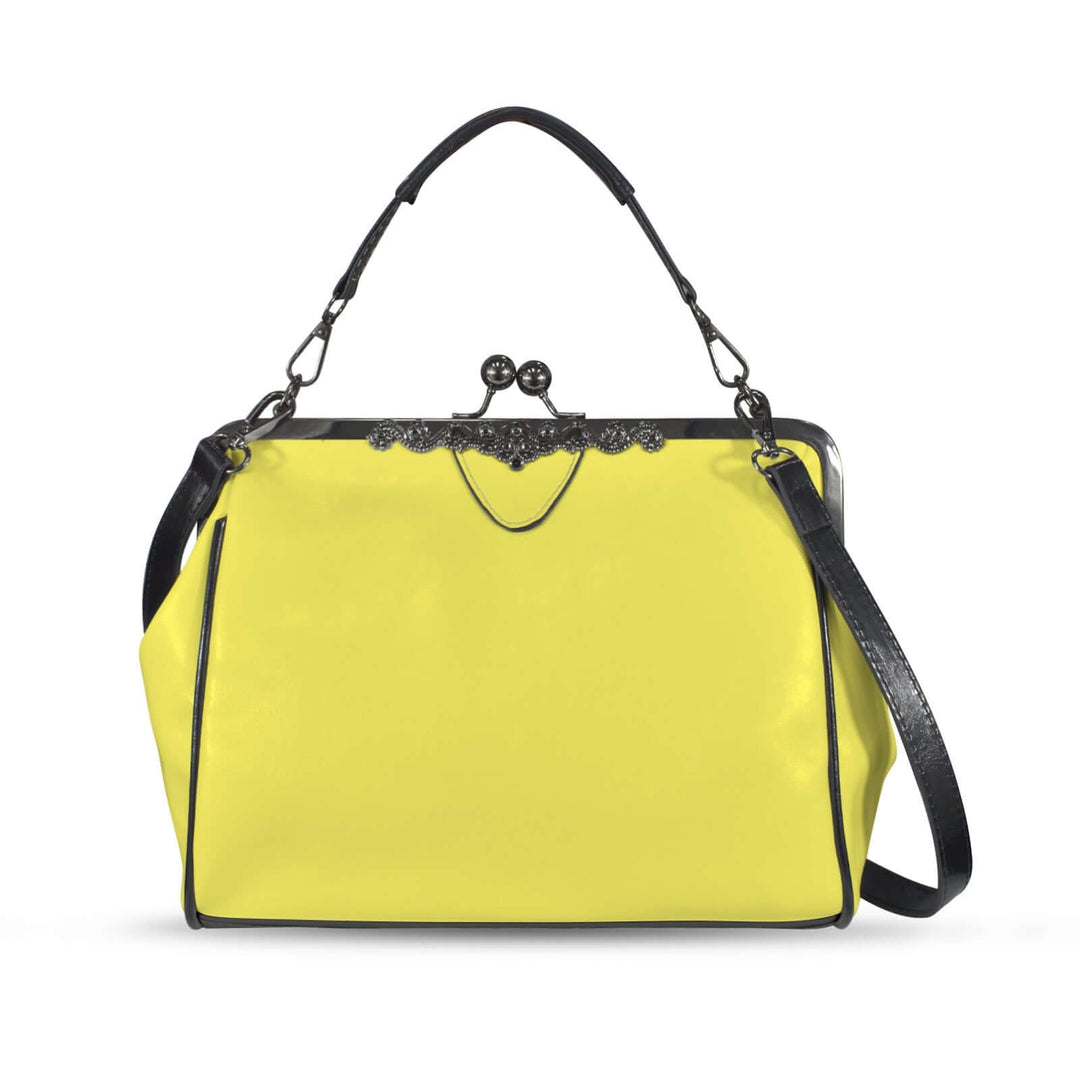 Kisslock vintage handbag in bright yellow with black accents, perfect for a retro-inspired look.