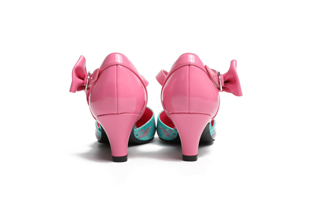 Back view of SugarPOP Mingo heels with pink bow, showcasing colorful flamingo design and kitten heel style.
