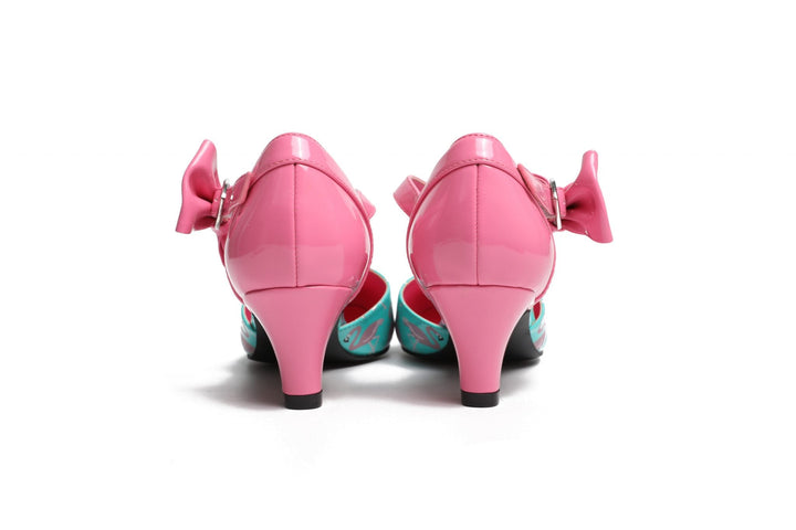 Back view of SugarPOP Mingo heels with pink bow, showcasing colorful flamingo design and kitten heel style.