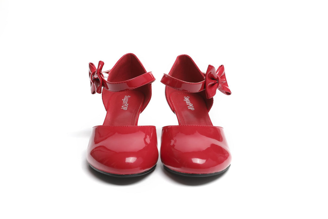 SugarPOP RedRum Mary Jane shoes in glossy red with adjustable bows and kitten heels.