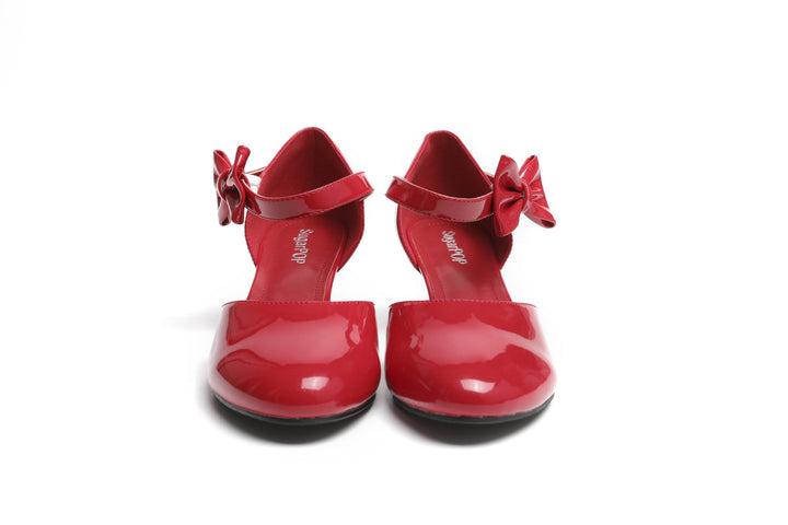 SugarPOP RedRum Mary Jane shoes in glossy red with adjustable bows and kitten heels.
