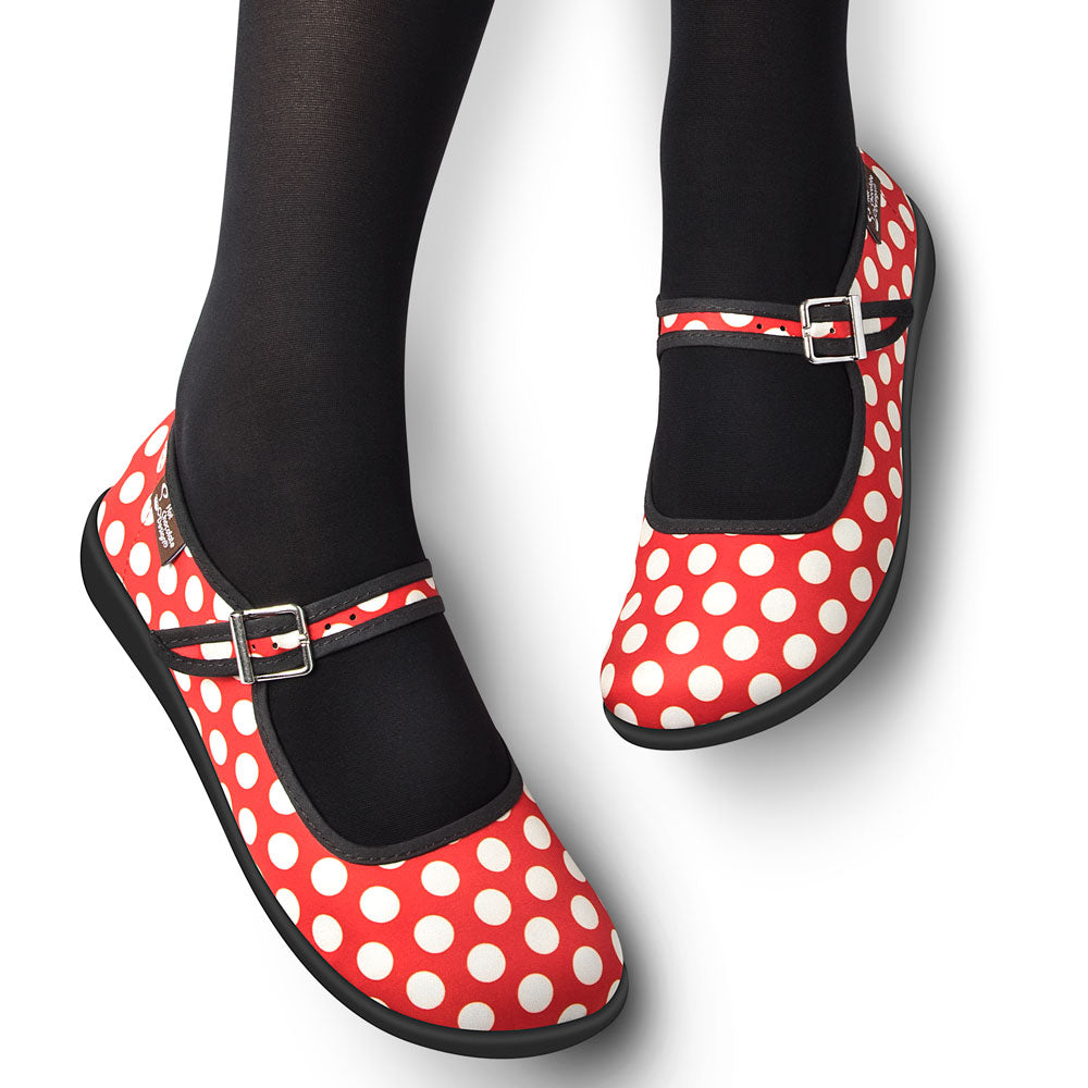 Hot Chocolate Design Red Polka shoes featuring vibrant red canvas and white polka dots for vintage style.