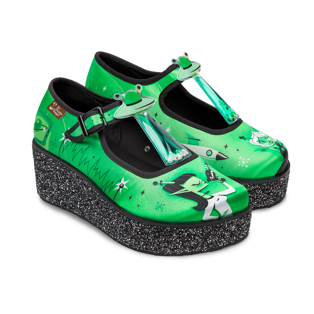 Hot Chocolate Design ET Gals Platform shoes featuring vibrant green extraterrestrial artwork and chunky glitter sole.