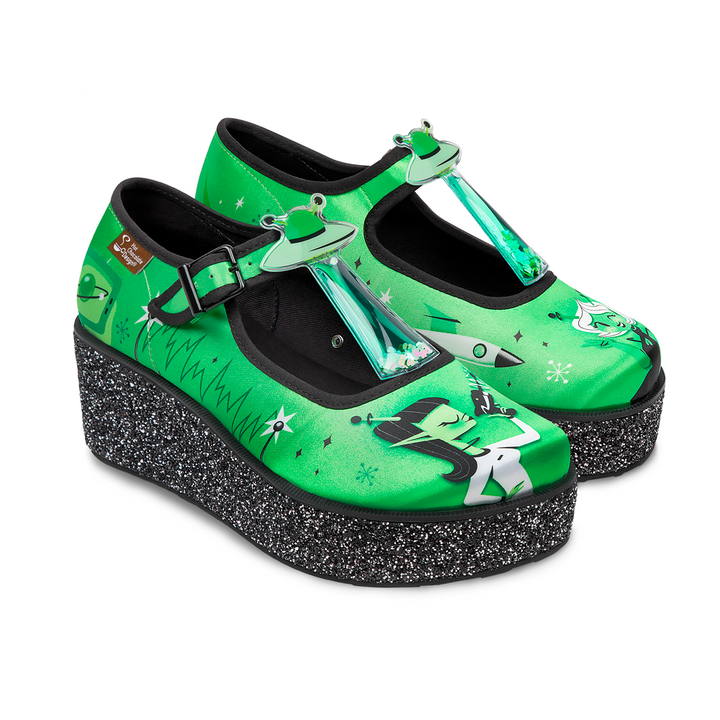 Hot Chocolate Design ET Gals Platform shoes featuring vibrant green extraterrestrial artwork and chunky glitter sole.