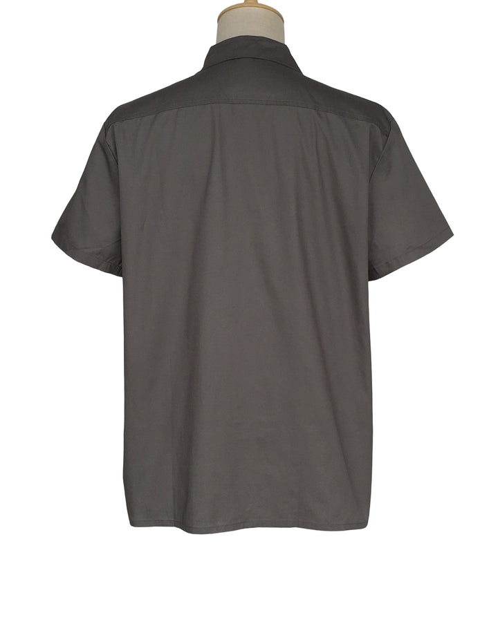 Gray short-sleeve shirt on a mannequin against a white background