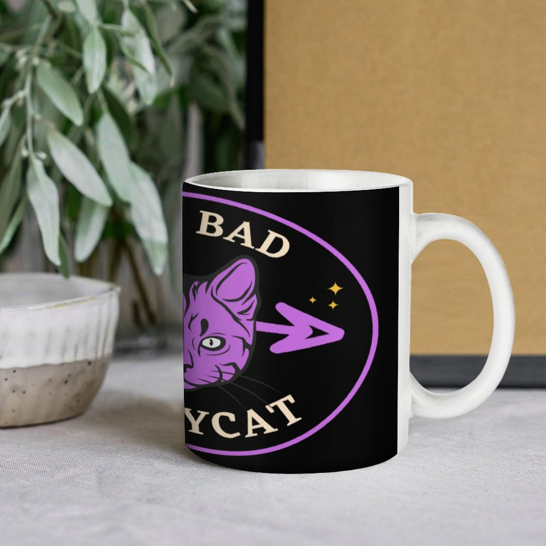 Bad Bad Kitty Cat white ceramic mug with retro design, perfect for coffee and tea, featuring a playful cat graphic.