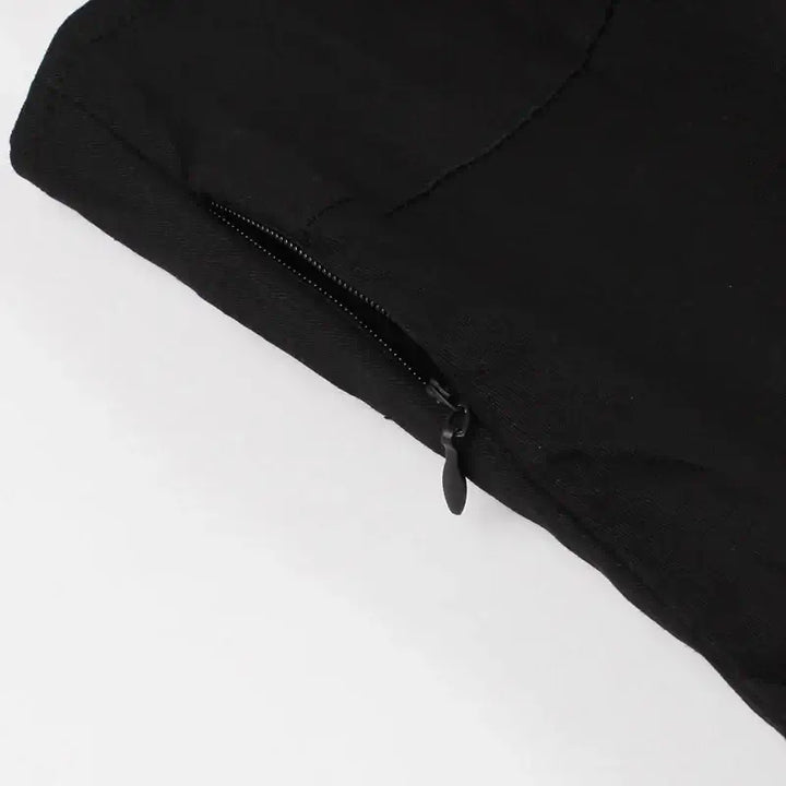 Detail of the zipper on the Bat Embroidered Vintage A-Line Halloween Dress showcasing quality craftsmanship.