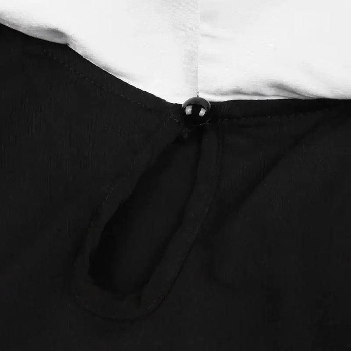 Close-up of keyhole detail and button closure on Bat Embroidered Vintage A-Line Halloween Dress.