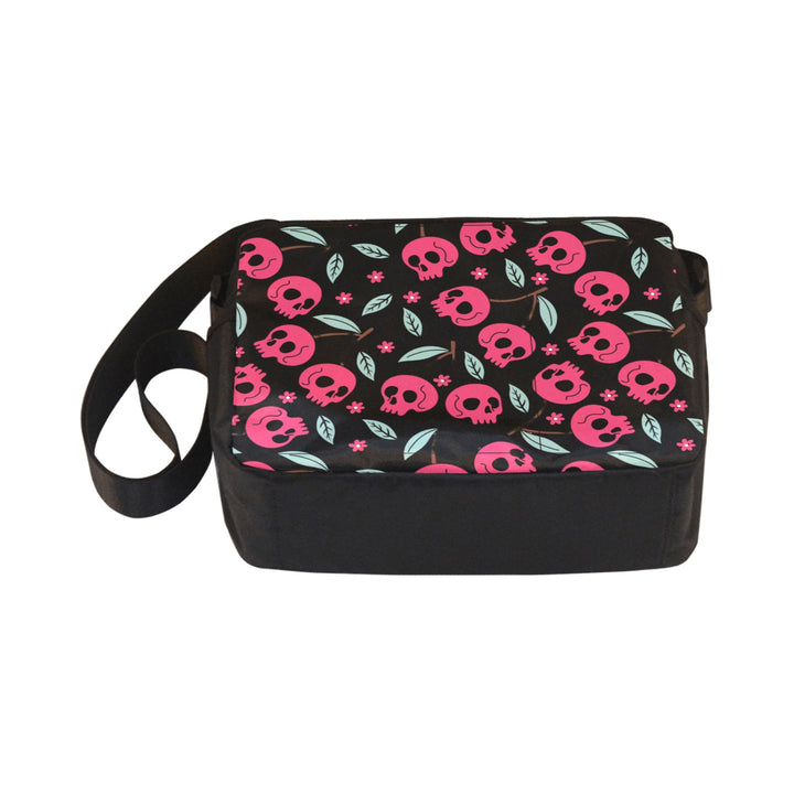 Cherry Skulls Crossbody Bag featuring pink skulls and leaves on a black background, perfect for edgy style and everyday use.