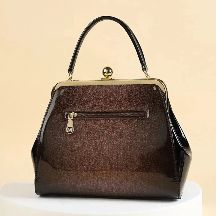 Chocolate Patent Rockabilly Handbag in high-shine vinyl, perfect for vintage style and retro outfits.