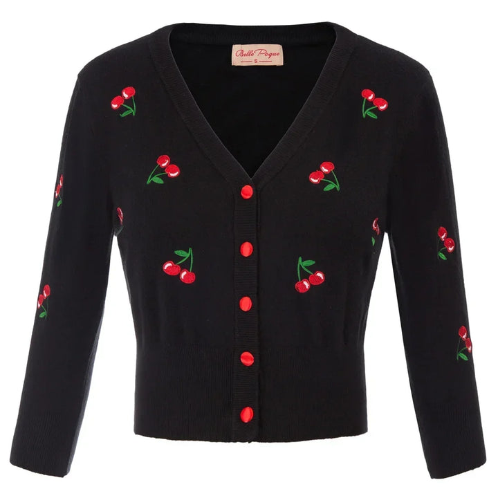Cropped black cardigan with cherry embroidery and red buttons, perfect for a vintage-inspired outfit.