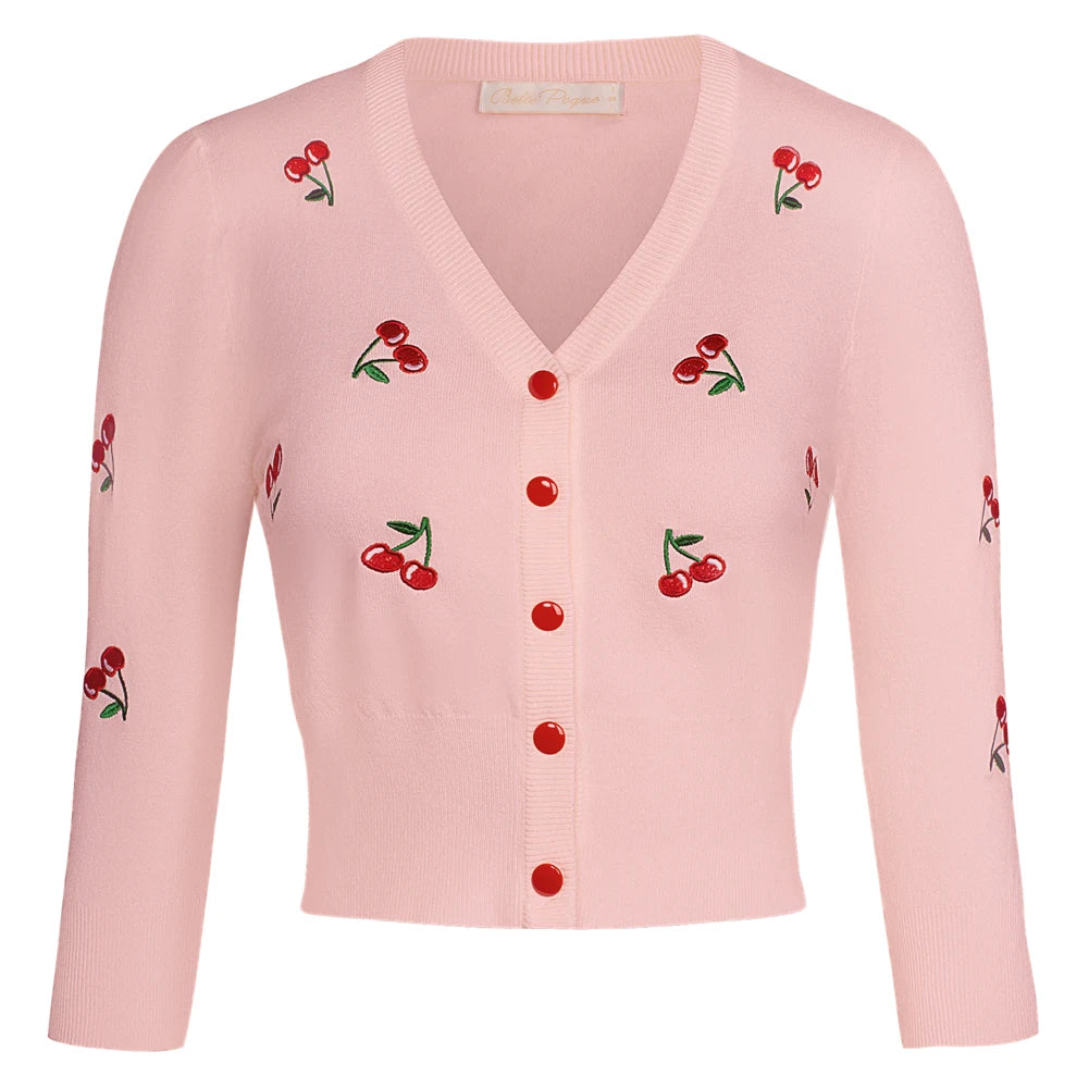 Cropped pink cardigan with cherry embroidery and red buttons, perfect for vintage-inspired outfits.