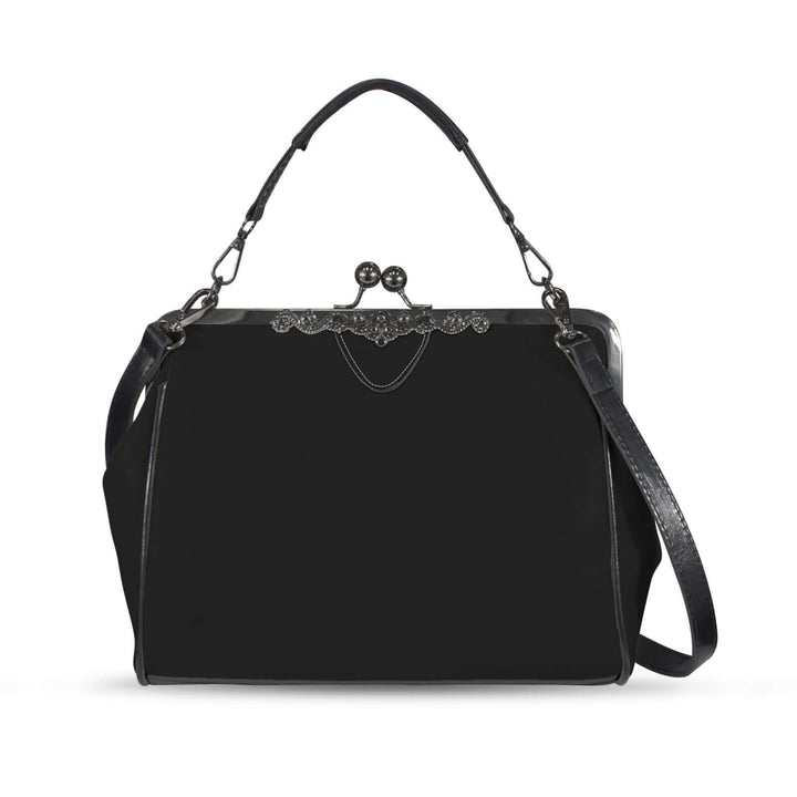Elegant black kisslock vintage handbag with structured silhouette and decorative clasp.