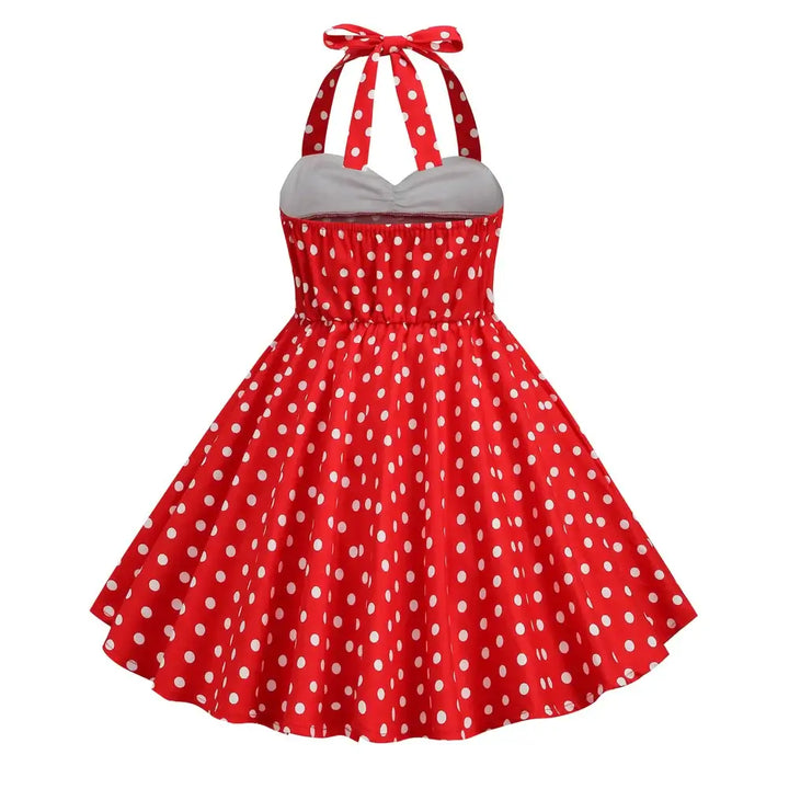 Girls Polka Dot Halter Rockabilly Dress in red with white dots, knee-length A-line design for playful occasions.