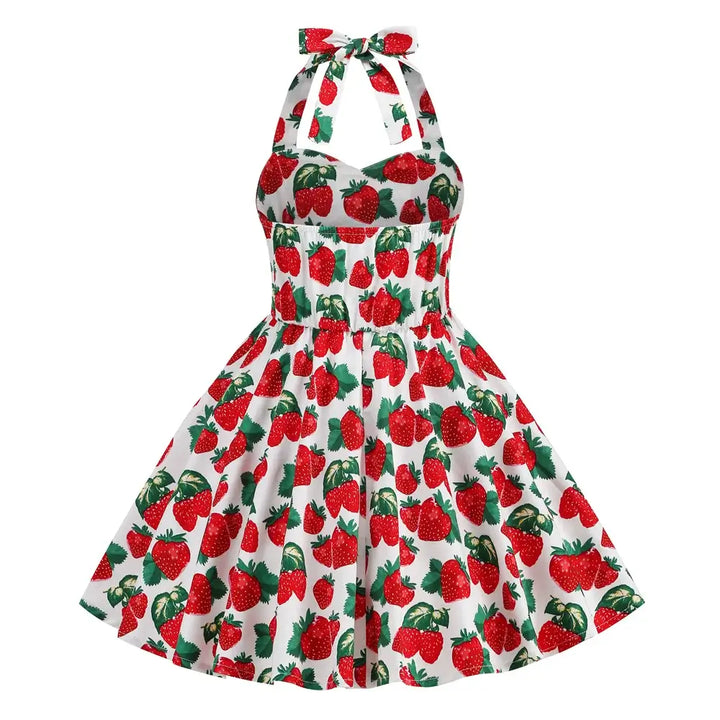 Girls Strawberry Halter Rockabilly Dress with playful strawberry print, vintage style, and knee-length A-line silhouette.