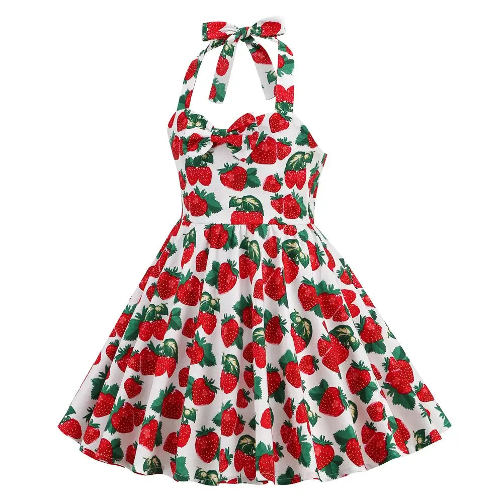 Girls Strawberry Halter Rockabilly Dress with playful strawberry print, perfect for twirling and summer fun.