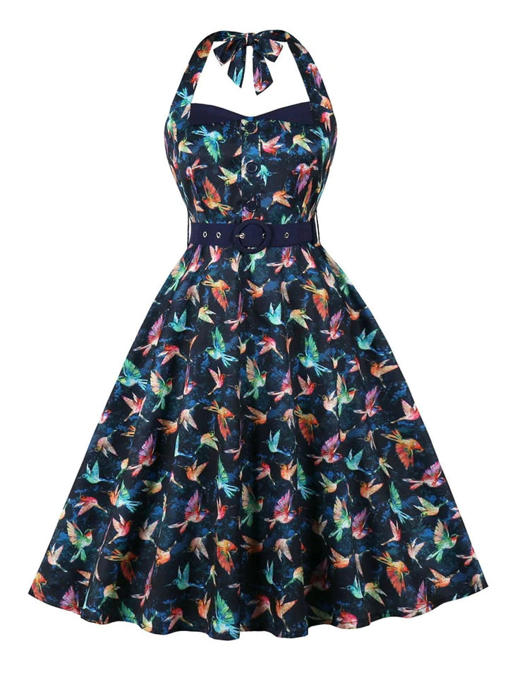 Hummingbird Print Sweetheart Halter A-Line Dress featuring vibrant colors on a navy blue rockabilly halter swing dress.