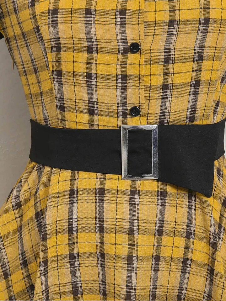 Detail of Lucille Plaid Single Breasted 50s Dress featuring a black belt and yellow plaid fabric design.