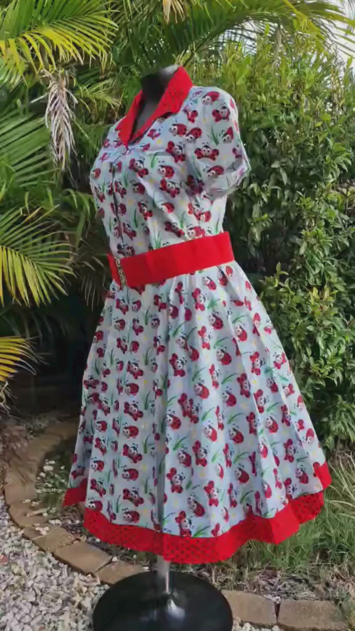 Ladybugs Full Circle Skirt showcasing a vintage design with red accents and pocket details, perfect for retro charm.