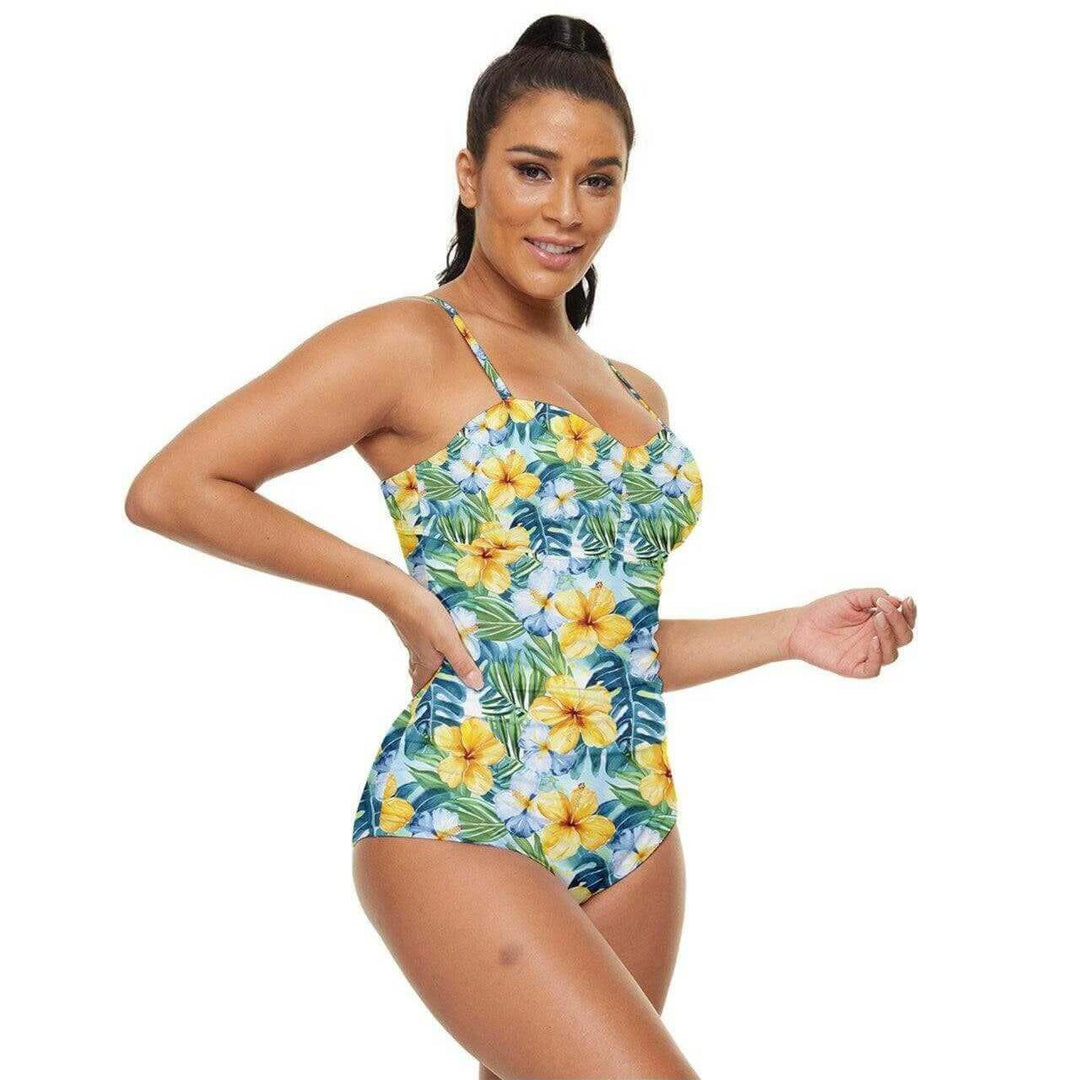 Tropical Hibiscus full coverage swimsuit featuring vibrant floral print, model showcasing stylish beachwear in bright colors.
