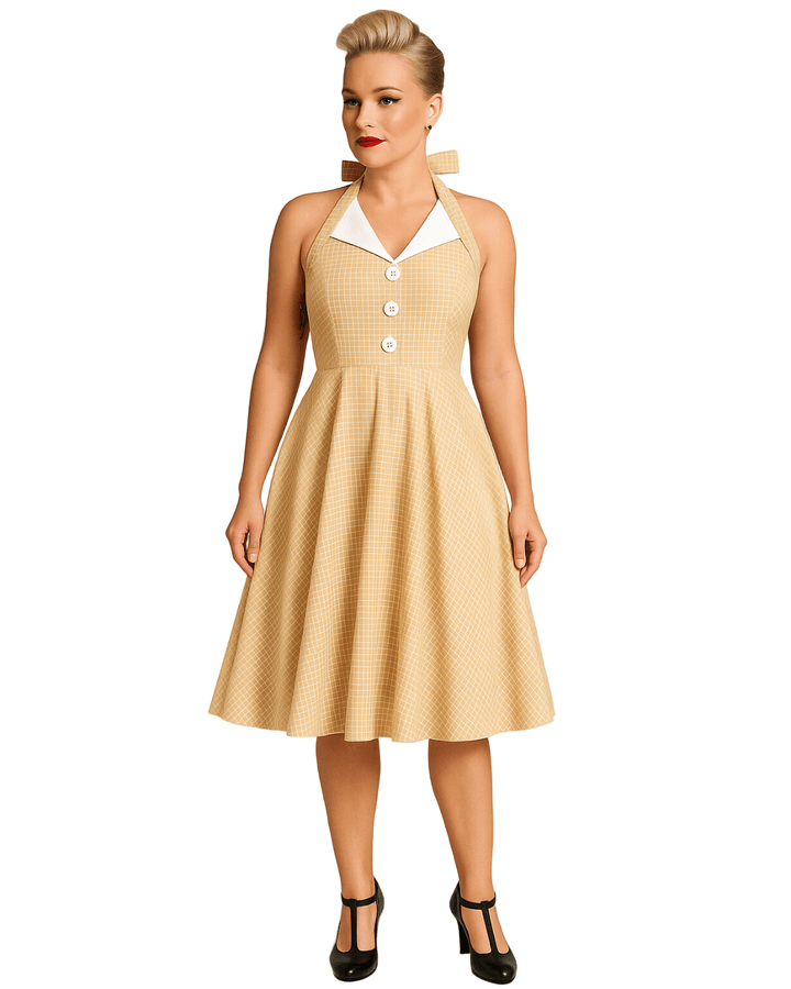Vintage Beige Halter Swing Dress with Pockets on a model, showcasing a playful white check pattern and flattering silhouette.