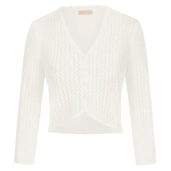 Vintage-inspired white knit bolero shrug with V-neckline and 3/4 sleeves, perfect for autumn layering.