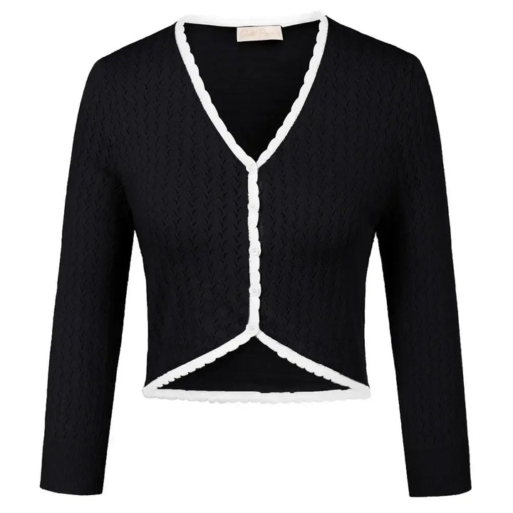 Vintage-inspired black knit bolero with white trim, 3/4 sleeves, V-neckline, perfect for layering in autumn and winter.
