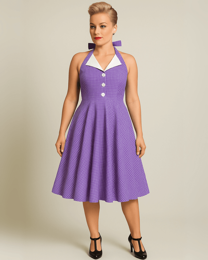 Vintage Lavender Halter Swing Dress with Pockets on a model, showcasing playful white check pattern and A-line silhouette.