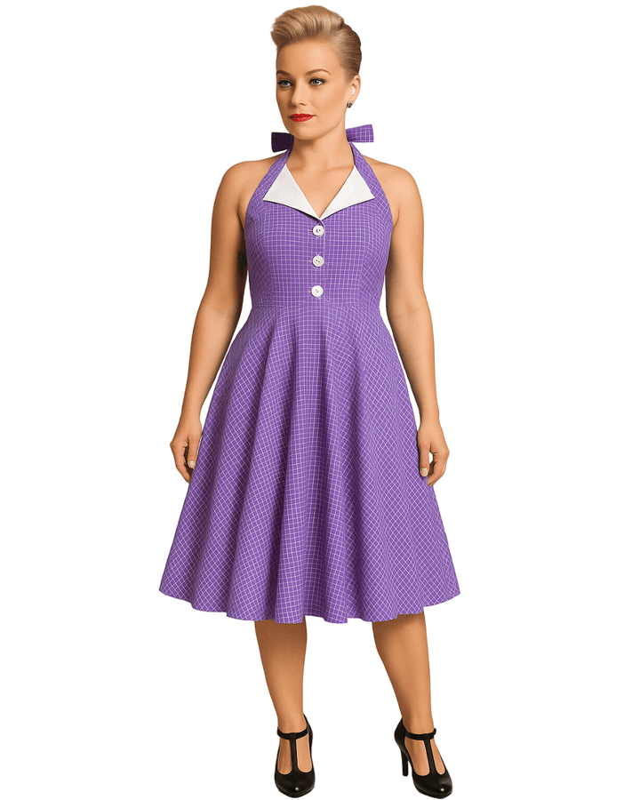 Vintage Lavender Halter Swing Dress with Pockets worn by a model showcasing its stylish design and flattering silhouette.