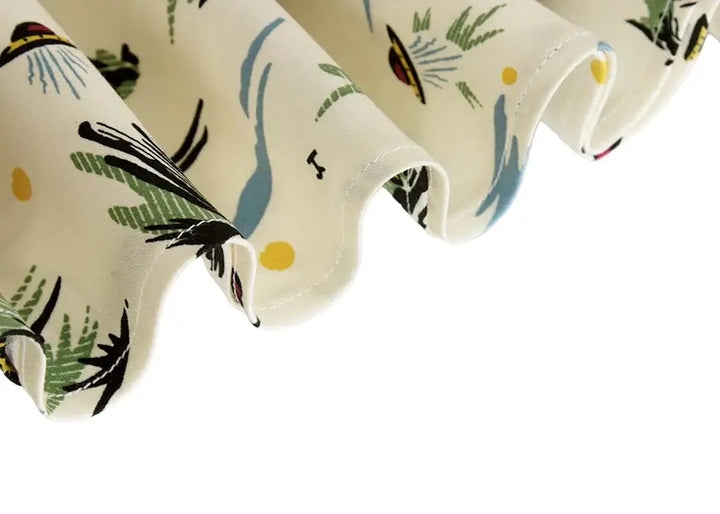 Close-up of the fabric texture of the Western Cowboy Flared Skirt with playful floral design and ruffled edges.