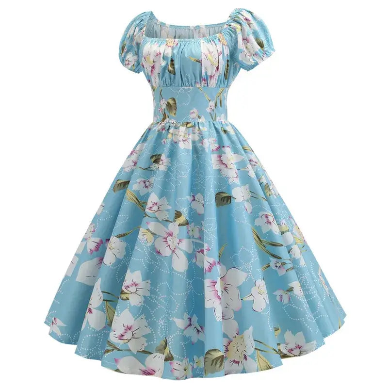 Vintage Peasant Style Blue Floral Dress featuring a square neckline and puff sleeves in light blue with floral prints.
