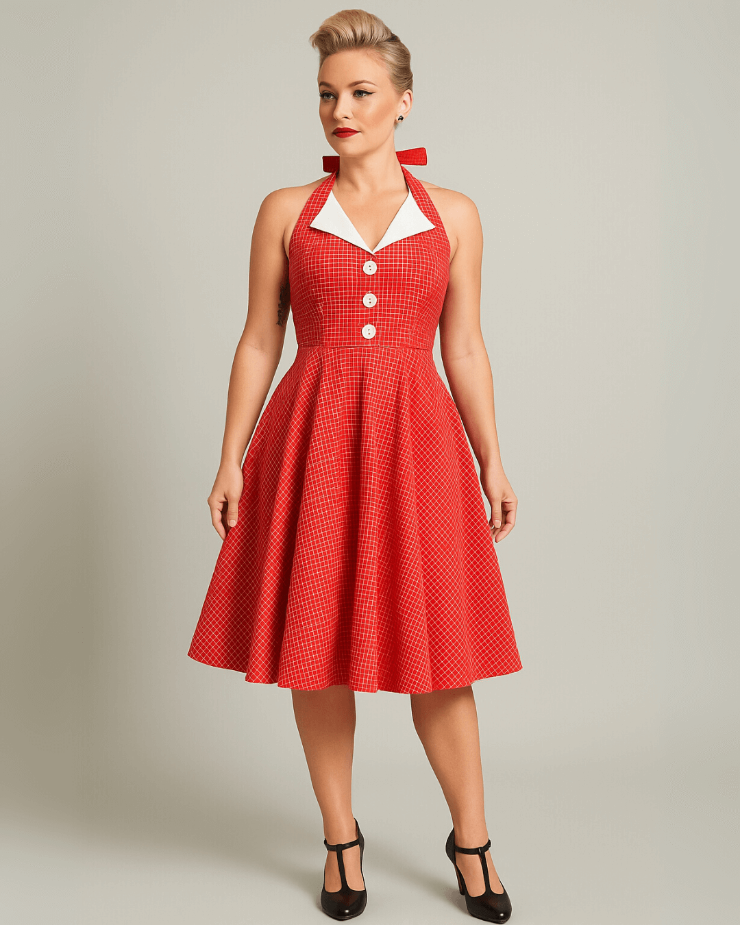 Vintage Red Halter Swing Dress with Pockets displayed by a model, showcasing its retro charm and stylish design.