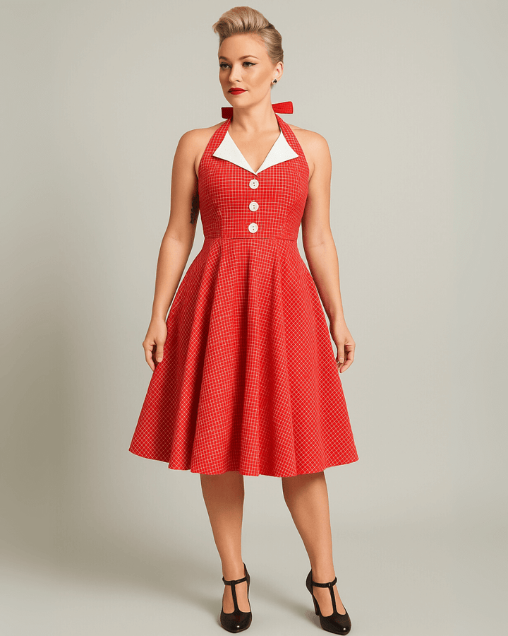 Vintage Red Halter Swing Dress with Pockets displayed by a model, showcasing its retro charm and stylish design.
