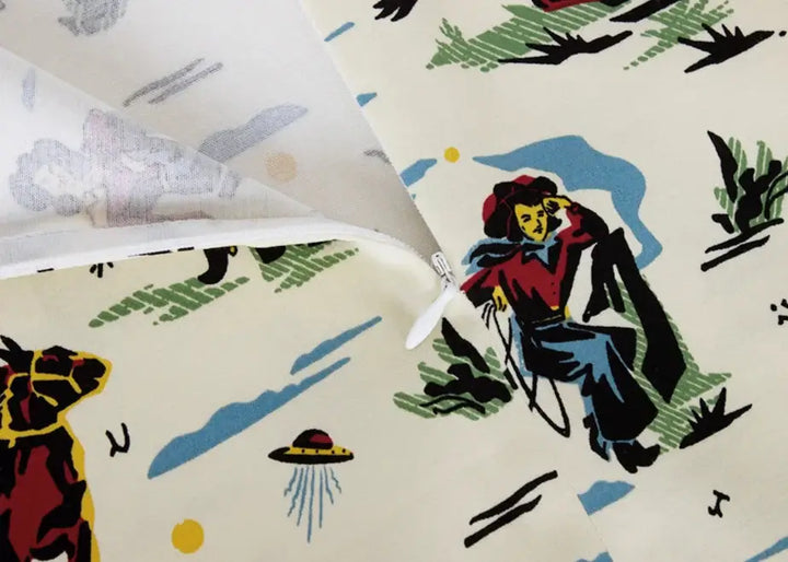 Western Cowboy Flared Skirt featuring playful retro print including cowgirls and UFOs on creamy background.