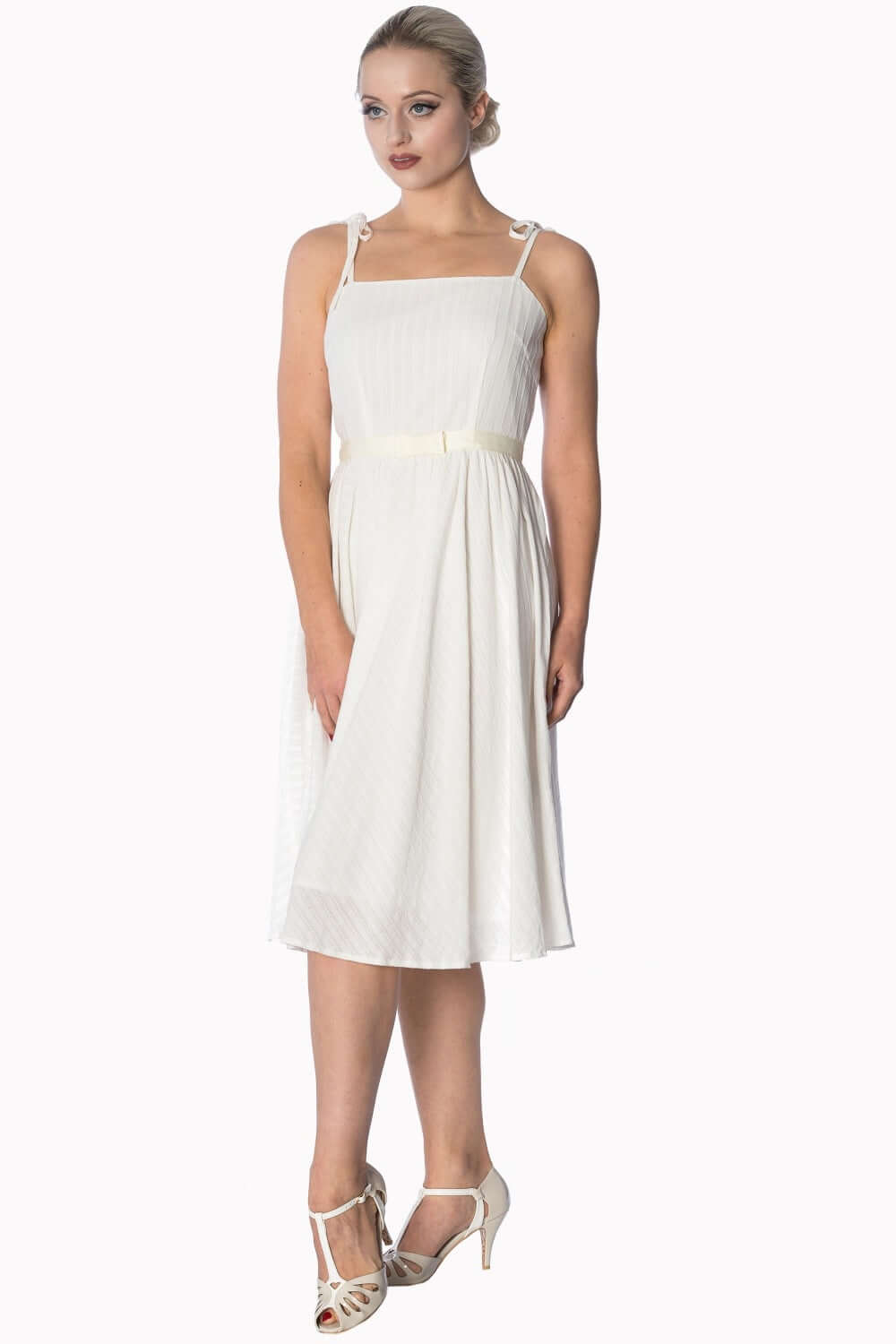 Elegant white strappy sundress with embroidered stripes, perfect for any occasion.