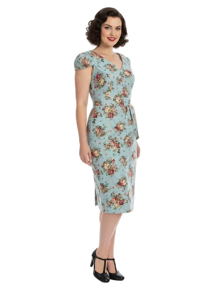 Light blue floral pencil dress with cap sleeves and tie waist, worn by model in side view on white background