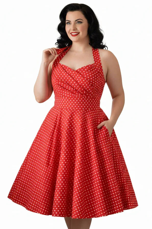 Red vintage-style women’s halter dress with white polka dots and full swing skirt
