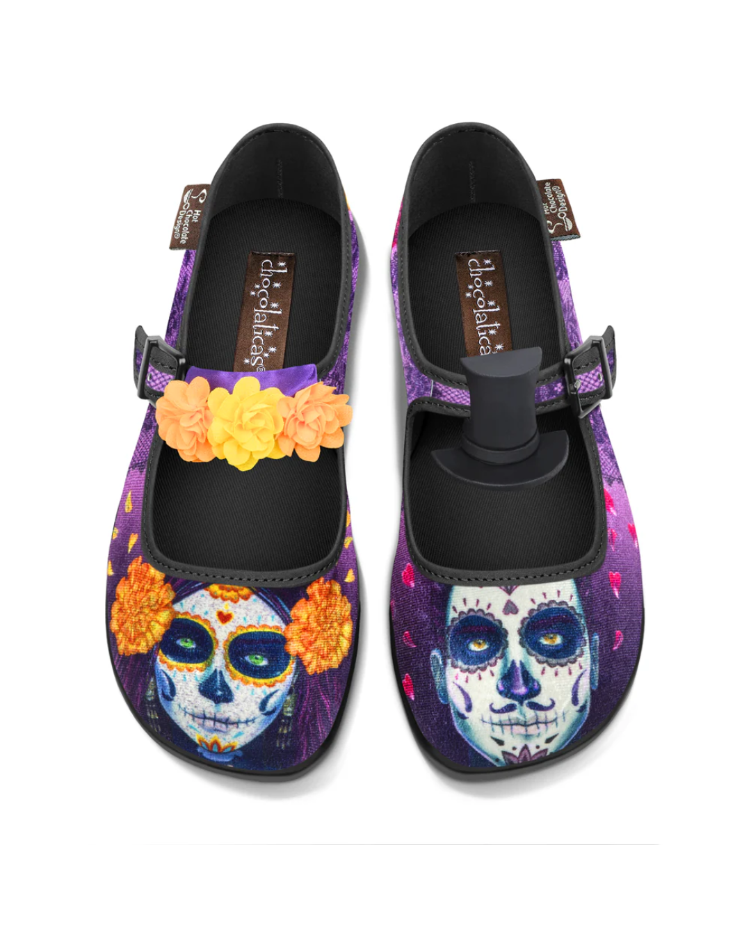 Hot Chocolate Design Dia de Muertos shoes with vibrant Day of the Dead artwork and floral accessories.