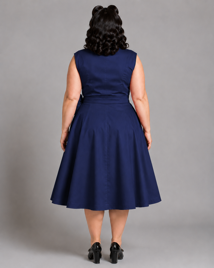 Vivienne blue A-line dress on a UK16 model showing the high back and full skirt