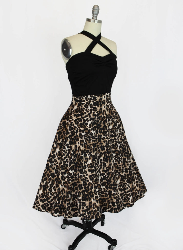 Leopard print 1950s skirt displayed with a fitted black halter top