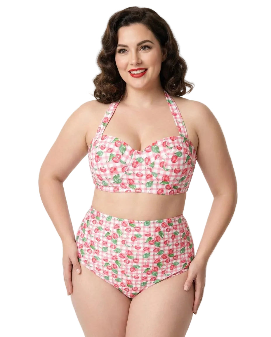 Woman wearing a pink floral bikini set on a white background