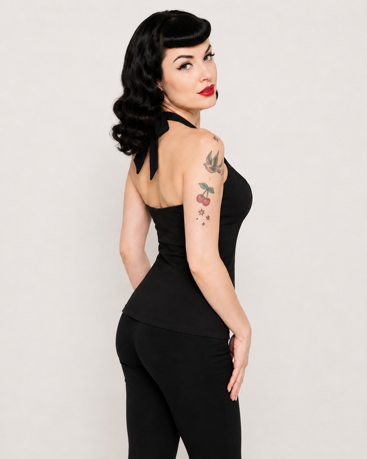 Liquorbrand black bow halter top side view on rockabilly model with vintage styling