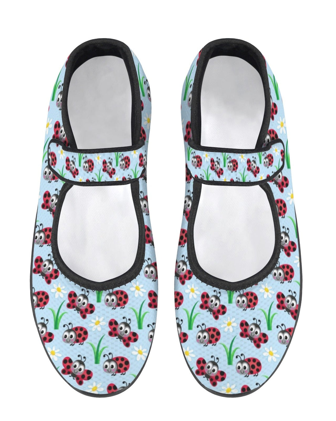 Pair of womens shoes with ladybug pattern on a light blue background