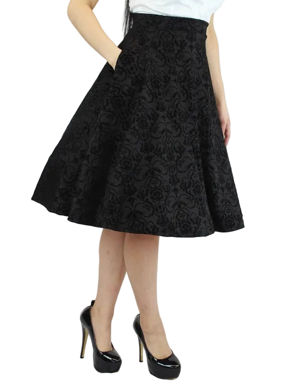 Black pleated skirt with practical side pockets