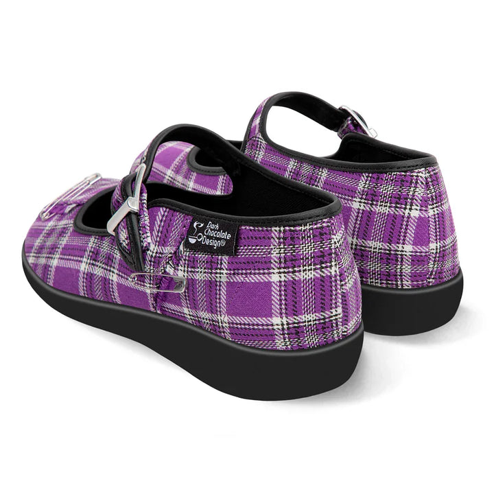 Purple plaid shoes with black soles on a white background