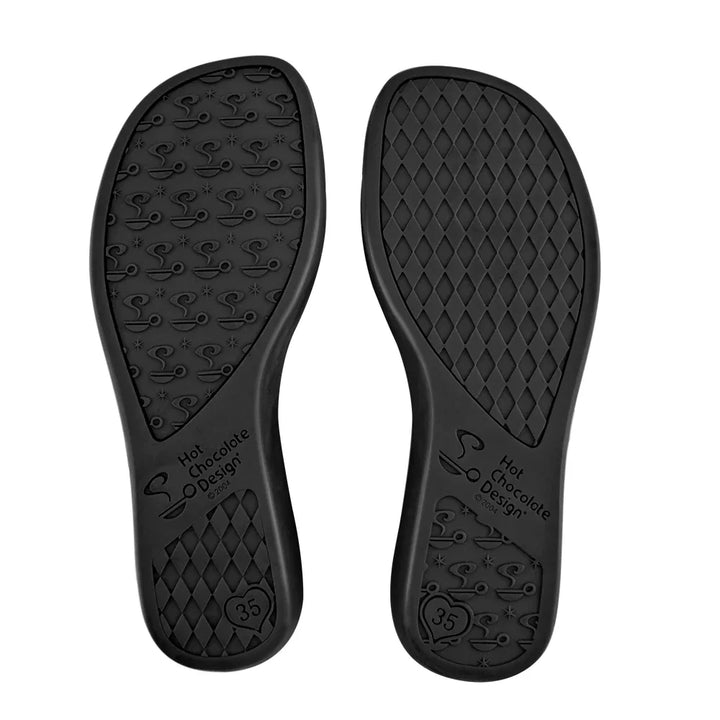 Black shoe insoles with textured surface and brand logo on a white background