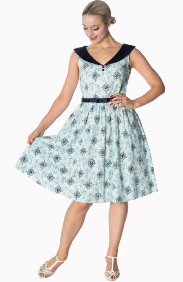 Woman wearing a floral dress with a white background