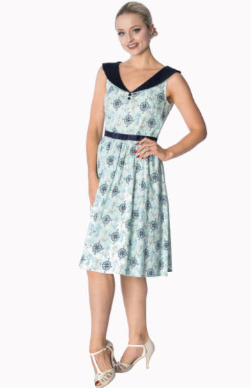 Woman wearing a floral dress with a white background