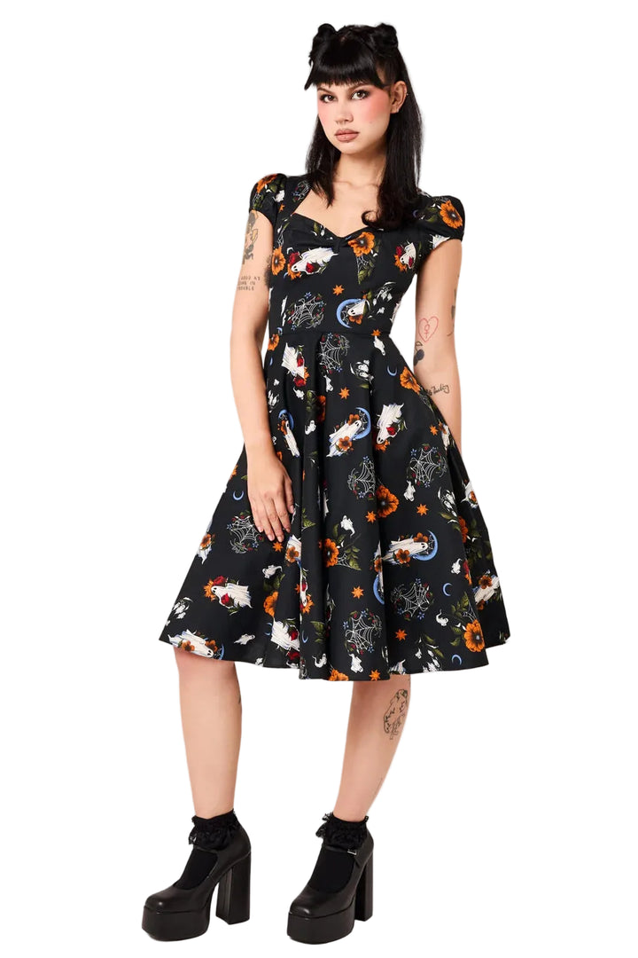 Model wearing Hell Bunny Ghost Flower black Halloween 50s dress with puff sleeves